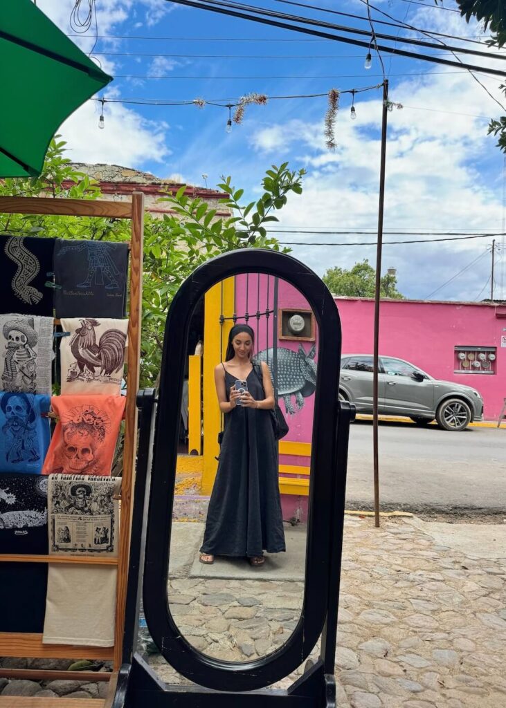 woman in colourful streets of Oaxaca City