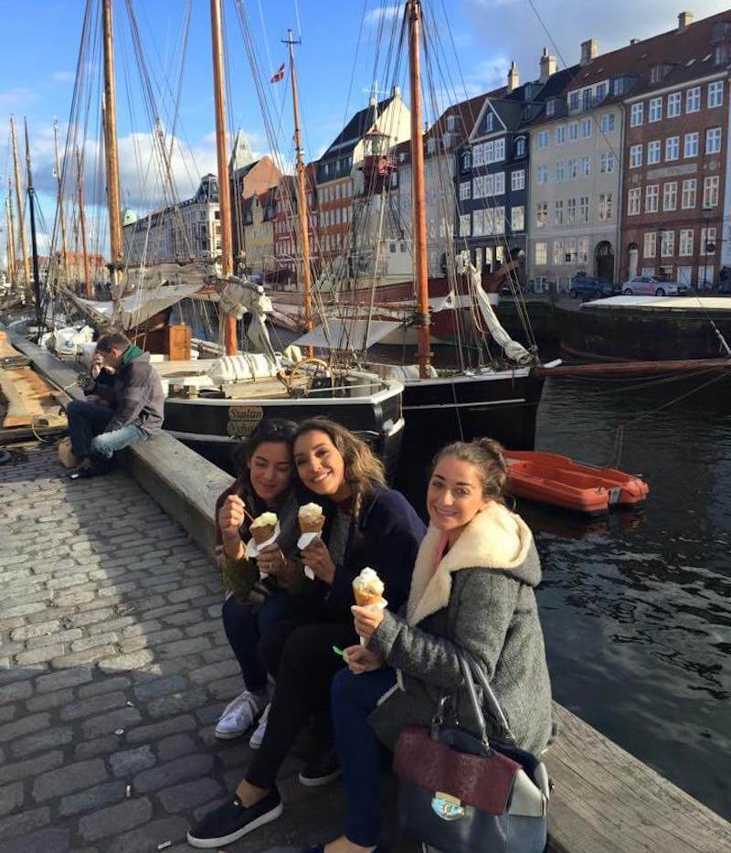 three women in Copenhagen eating ice cream
