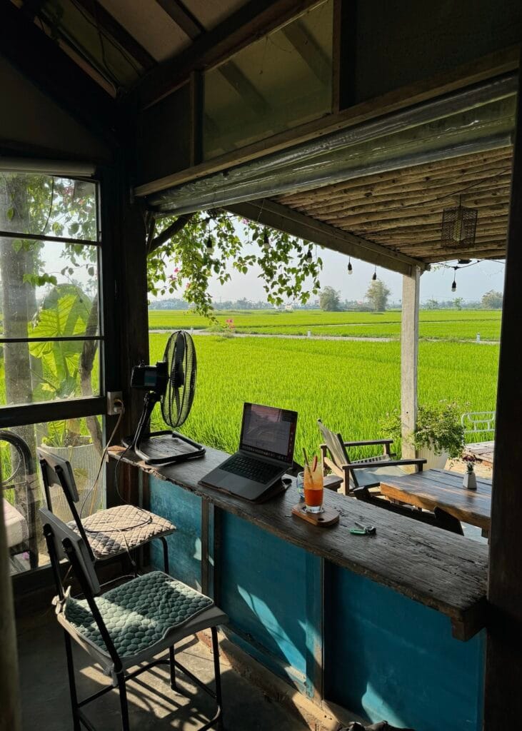 working laptop hoi an vietnam cafe rice fields