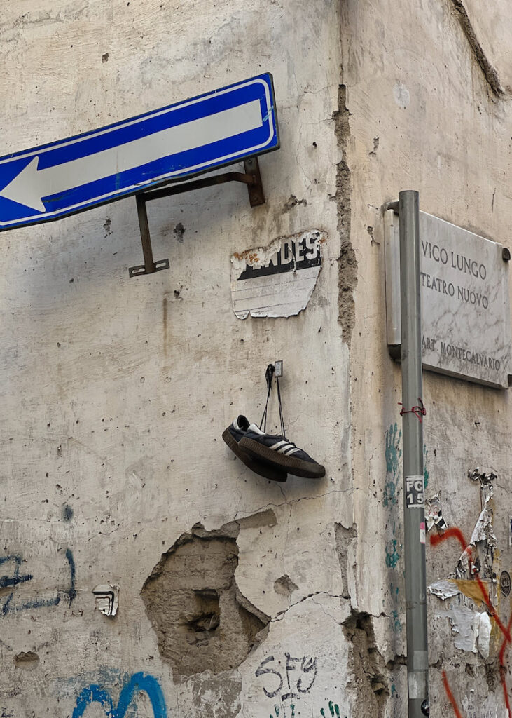 naples shoes hanging on wall