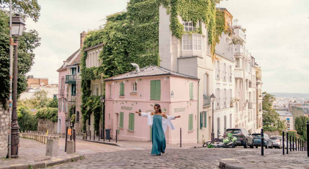 woman in dress montmartre pink cafe
