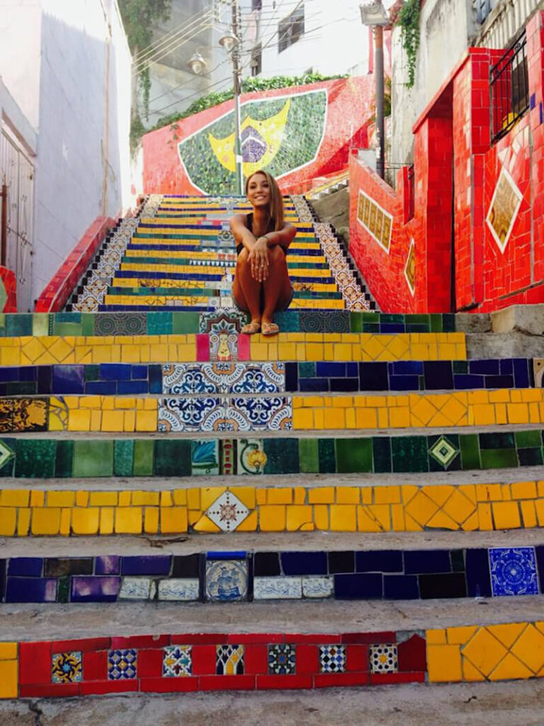 woman on colourful steps rio de janeiro