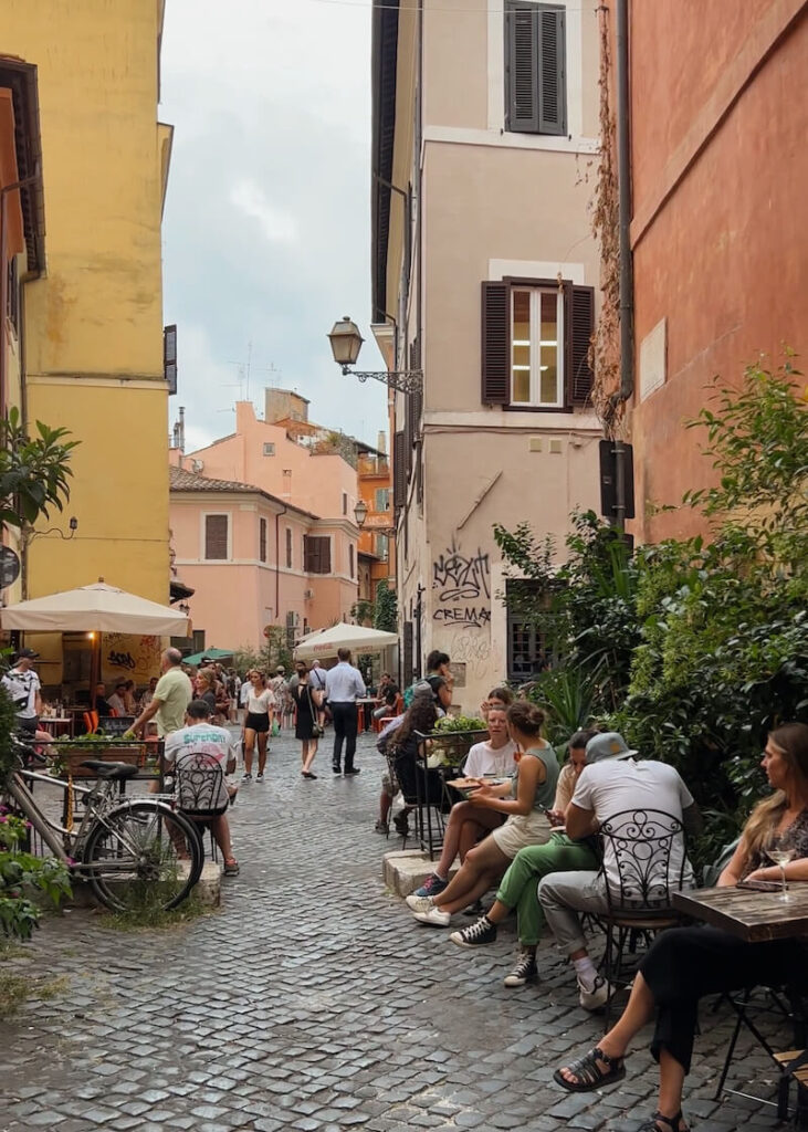 rome neighbourhood people outside drinking