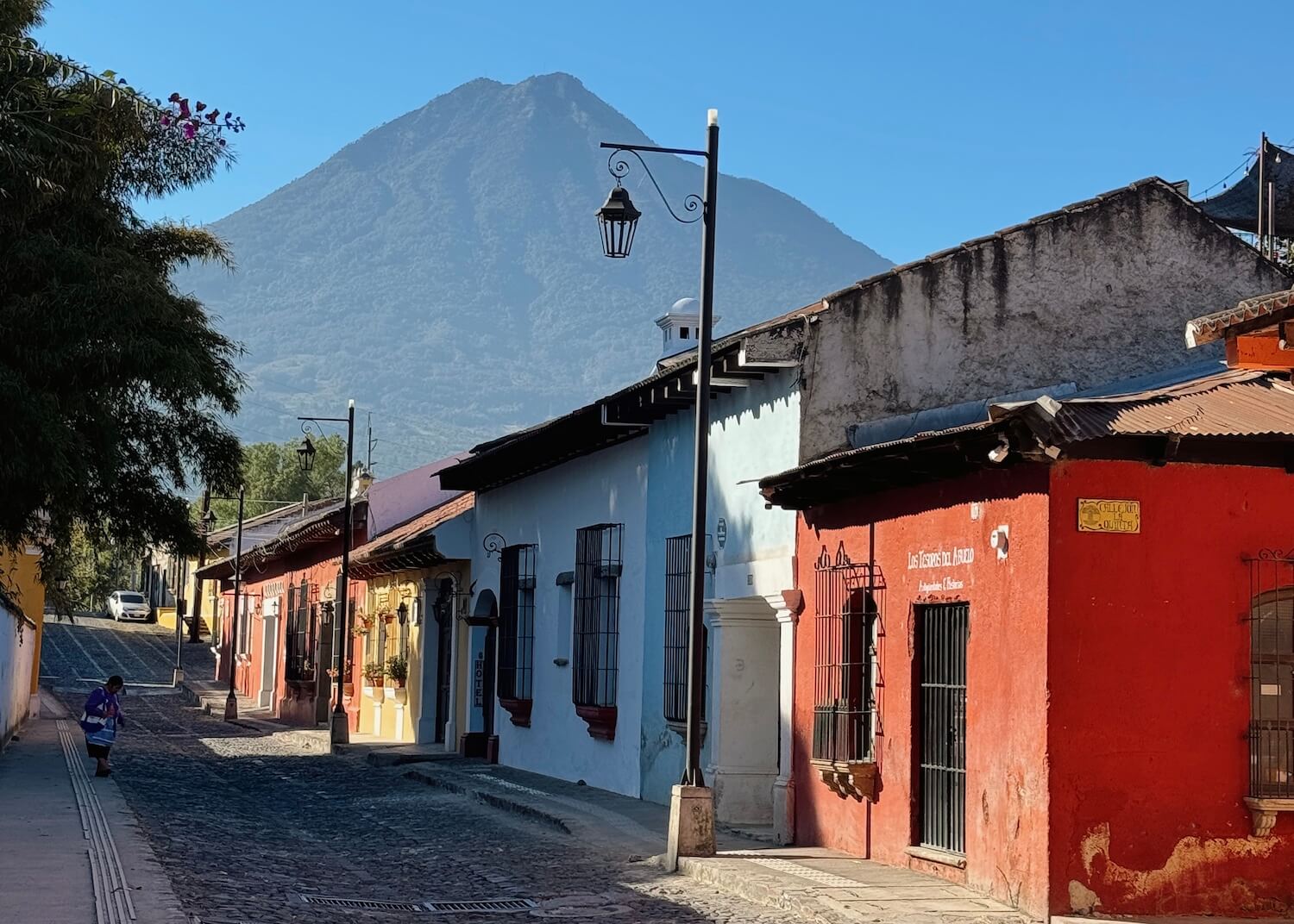 Colourful streets of Antigua Guatemala volcano background