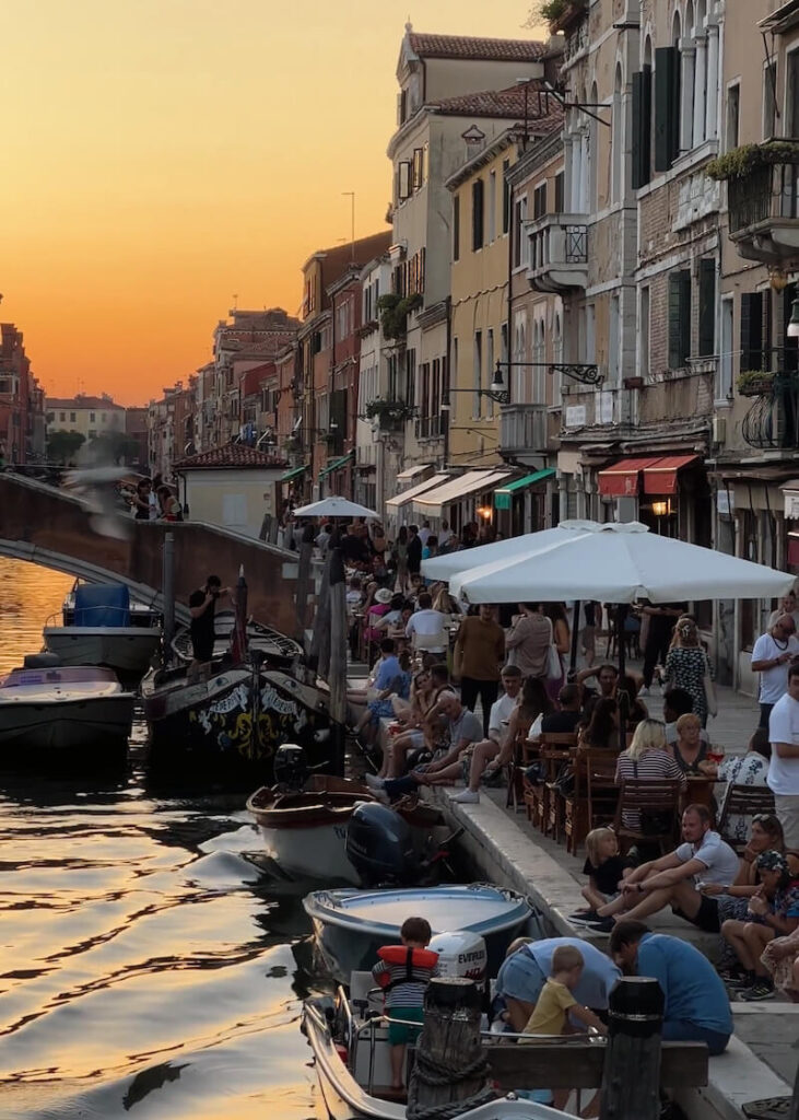venice sunset bridge canal people outside