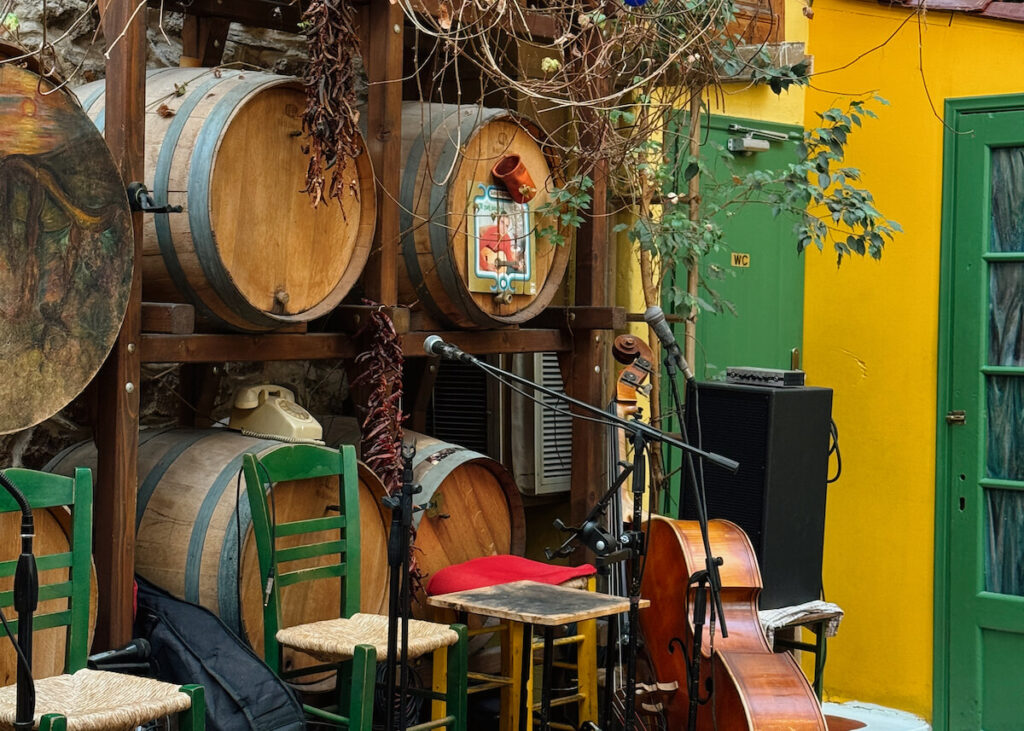 athens greece local restaurant yellow walls taverna wine barrels