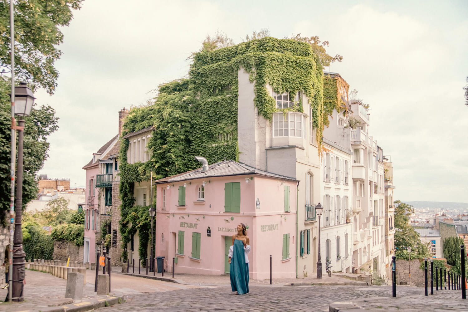 woman in dress paris montmarte pink cafe