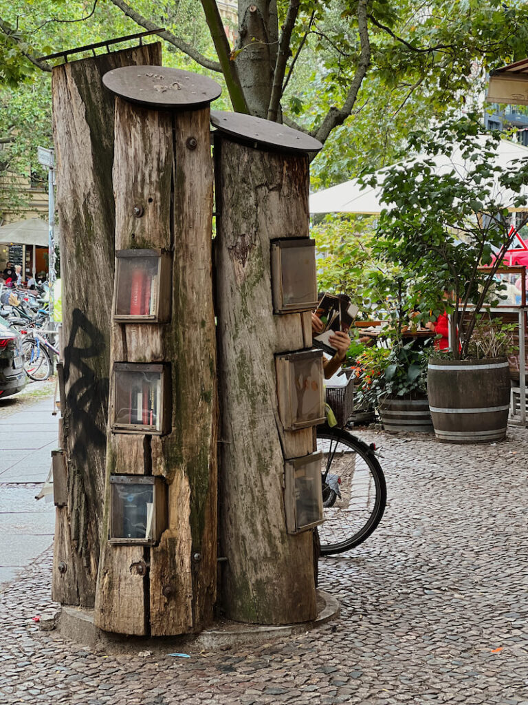 cute book exchange tree in prenzlauer berg berlin