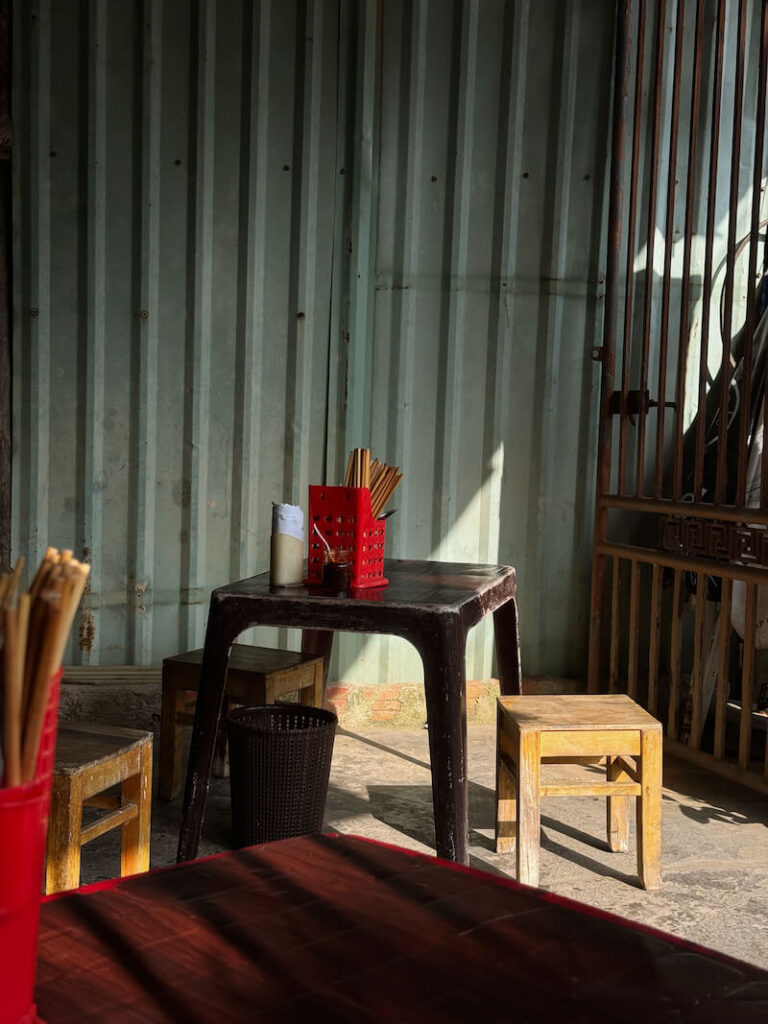 authentic little restaurant in hoi an small table and stools
