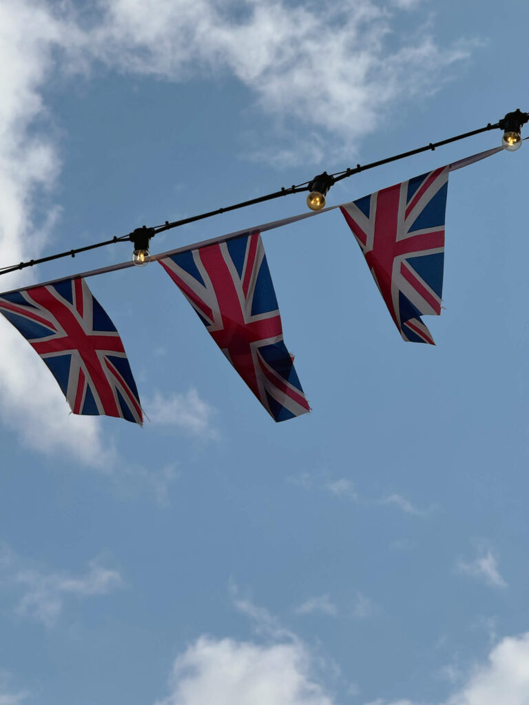 british flags in blue sky